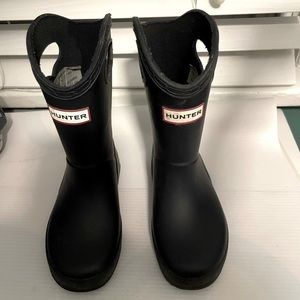 Hunter rain boots.